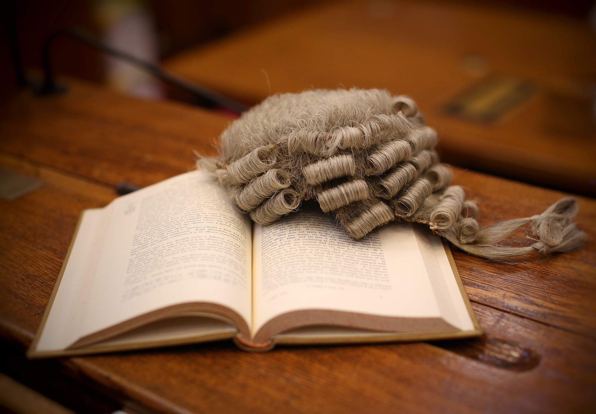 judge's wig and court text book